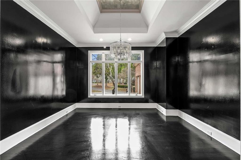 1483 Jones Road Roswell, GA 30075 - Photo 24 of 37 a view of room with window and hardwood floor