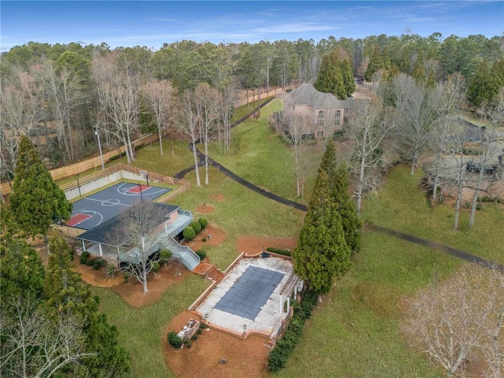 1483 Jones Road Roswell, GA 30075 - Photo 28 of 37 an aerial view of residential houses with outdoor space