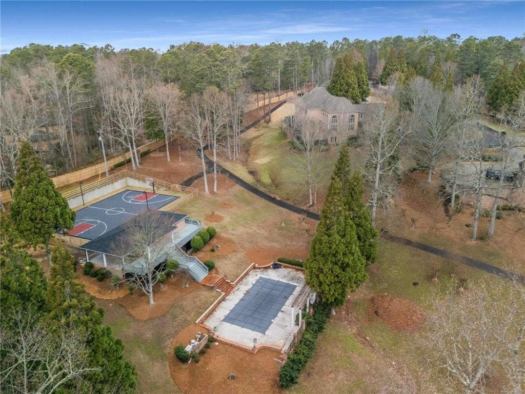 1483 Jones Road Roswell, GA 30075 - Photo 7 of 37 an aerial view of residential house with outdoor space