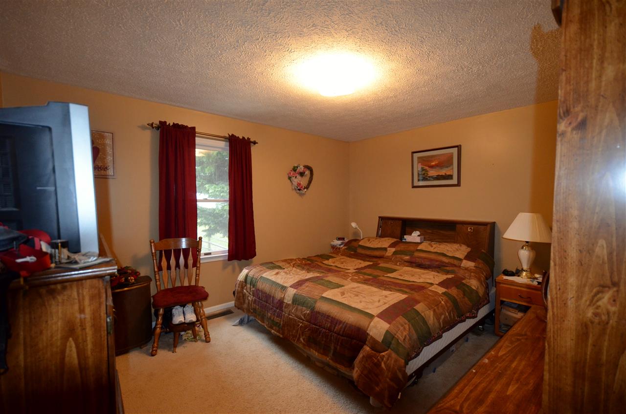 87 Ox Road Waynesboro, VA 22980 - Photo 11 of 25 a bedroom with a bed and a flat screen tv