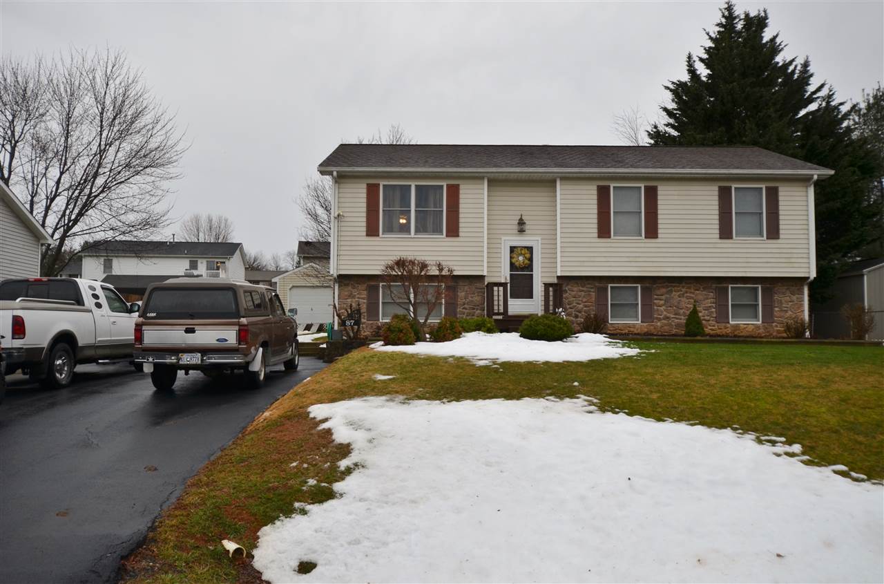 87 Ox Road Waynesboro, VA 22980 - Photo 25 of 25 a front view of a house with a yard and car parked