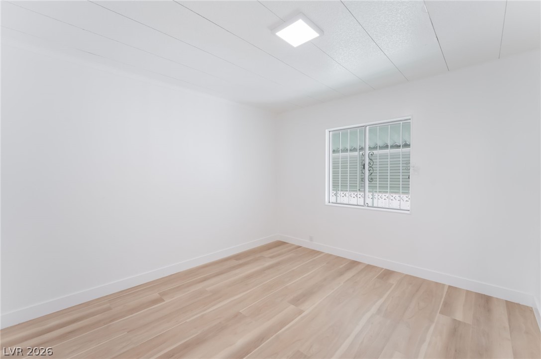 4980 Ridge Drive Las Vegas, NV 89103 - Photo 21 of 36 Spare room with light wood finished floors