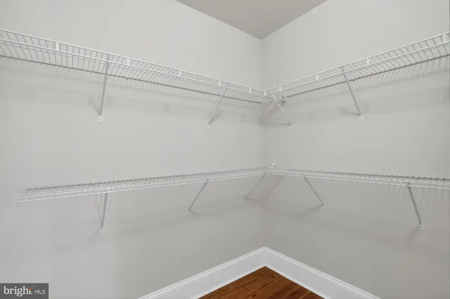 a view of a room with racks on the wall