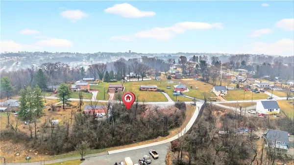 a view of a swimming pool with a lake view and mountain view