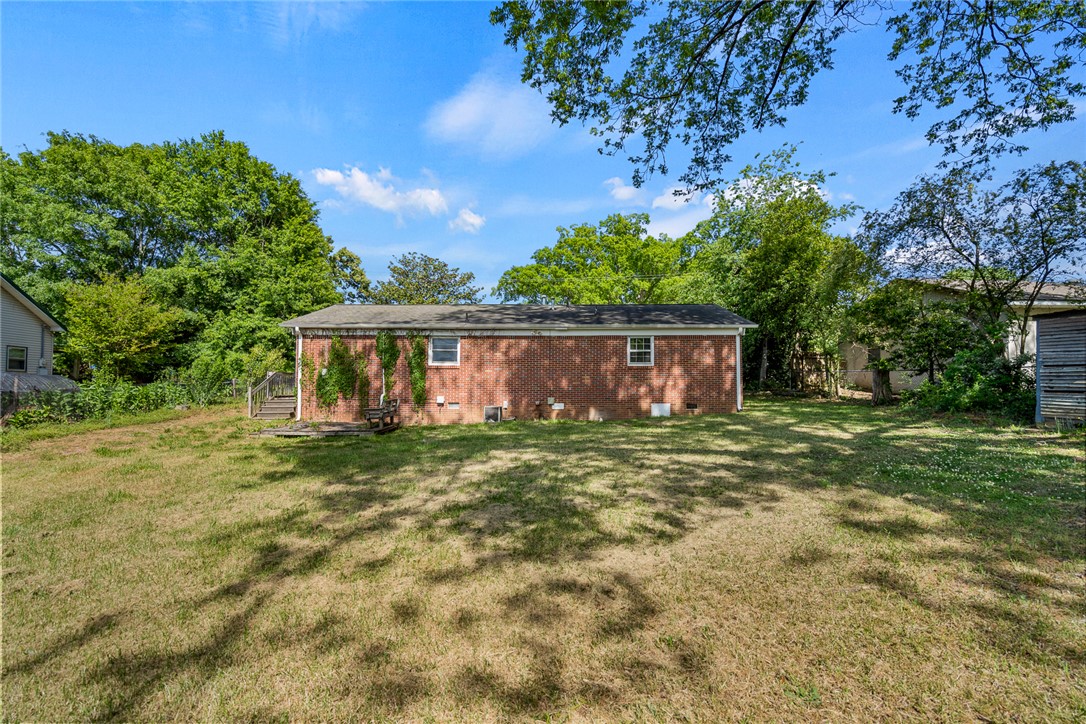 308 Clayton Street Central, SC 29630 - Photo 24 of 31 This spacious yard offers ample outdoor living potential, perfect for leisure and recreation.