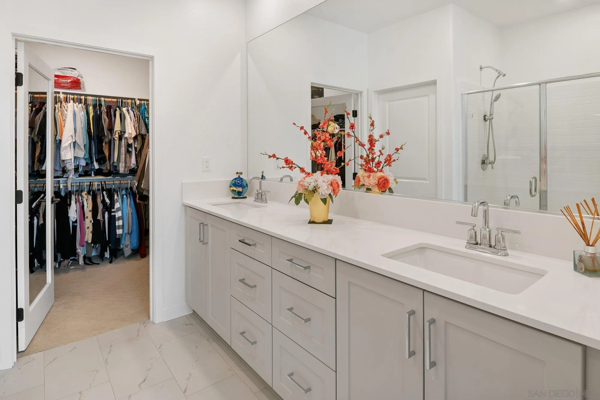 1091 Barry Place Escondido, CA 92026 - Photo 14 of 40 a bathroom with a double vanity sink and a mirror