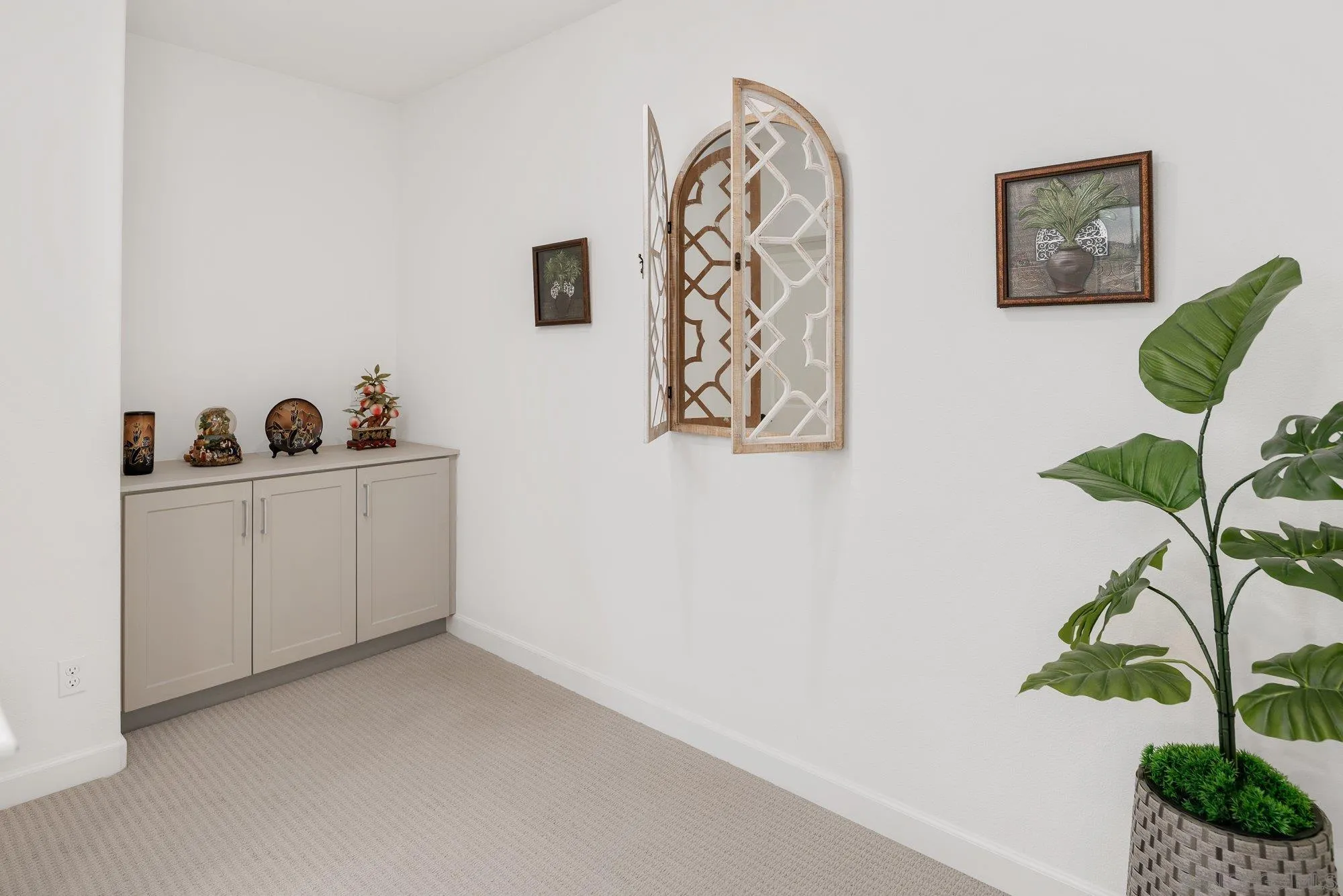 1091 Barry Place Escondido, CA 92026 - Photo 20 of 40 a view of a hallway with a flower pot