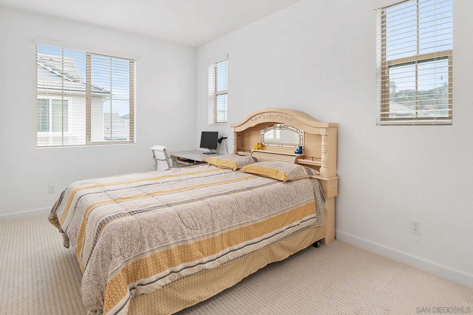 1091 Barry Place Escondido, CA 92026 - Photo 22 of 40 a bedroom with a bed and window