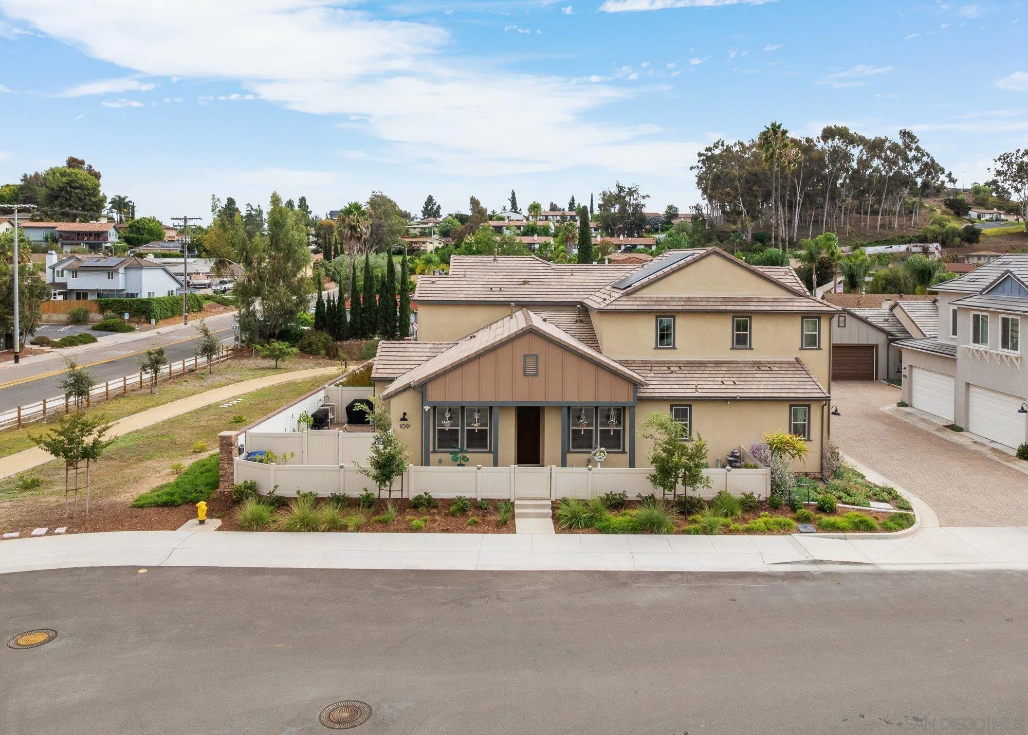 1091 Barry Place Escondido, CA 92026 - Photo 27 of 40 a front view of a house with a garden