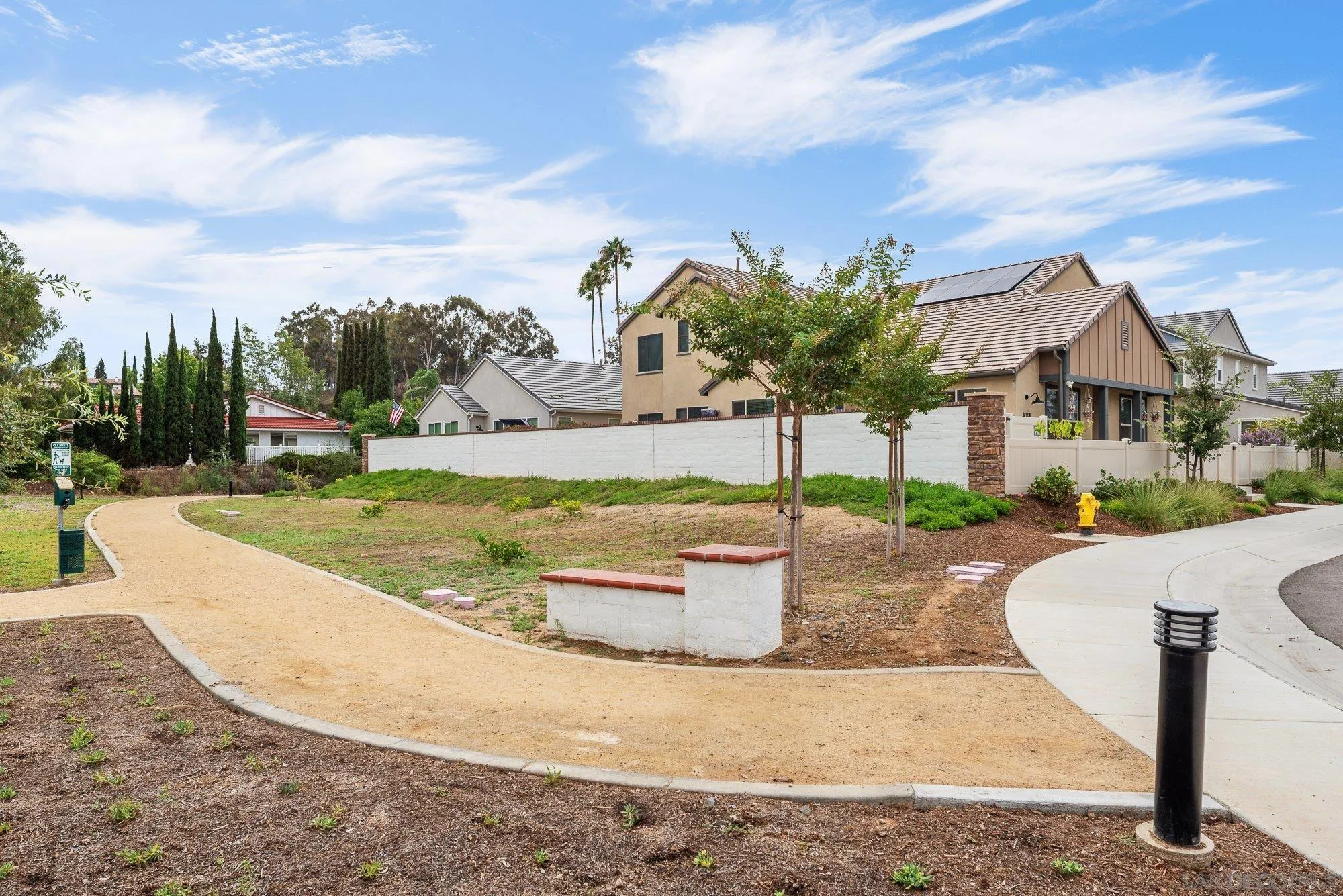 1091 Barry Place Escondido, CA 92026 - Photo 30 of 40 a view of a house with a yard