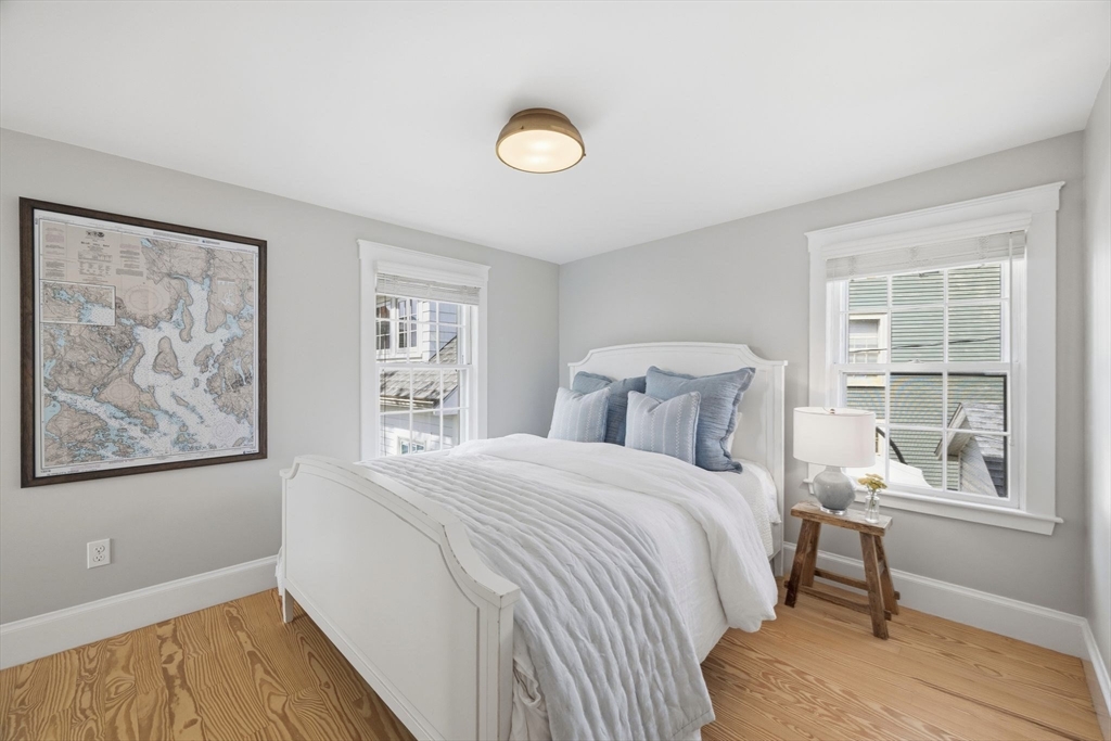 33 Franklin Street Marblehead, MA 01945 - Photo 26 of 42 a bedroom with a bed and a window