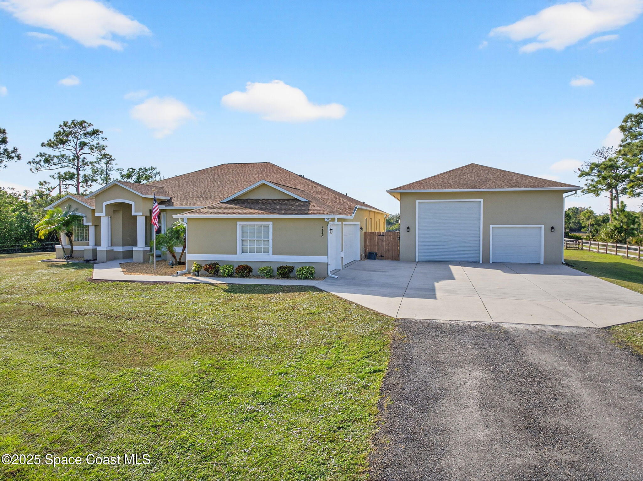 2740 Waring Lane Malabar, FL 32950 - Photo 3 of 98 a front view of a house with swimming pool