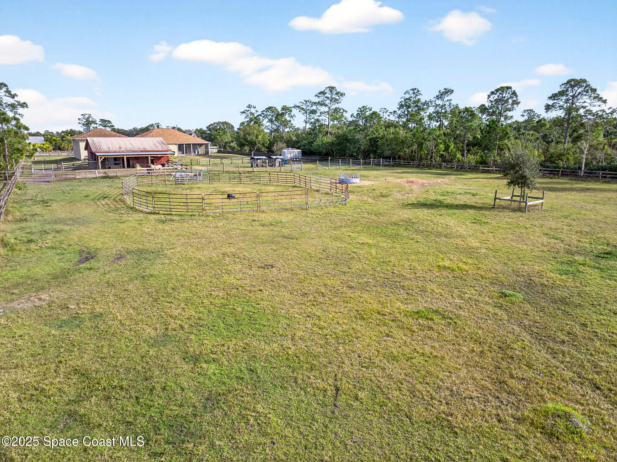 2740 Waring Lane Malabar, FL 32950 - Photo 31 of 98 a view of a lake with houses in the background