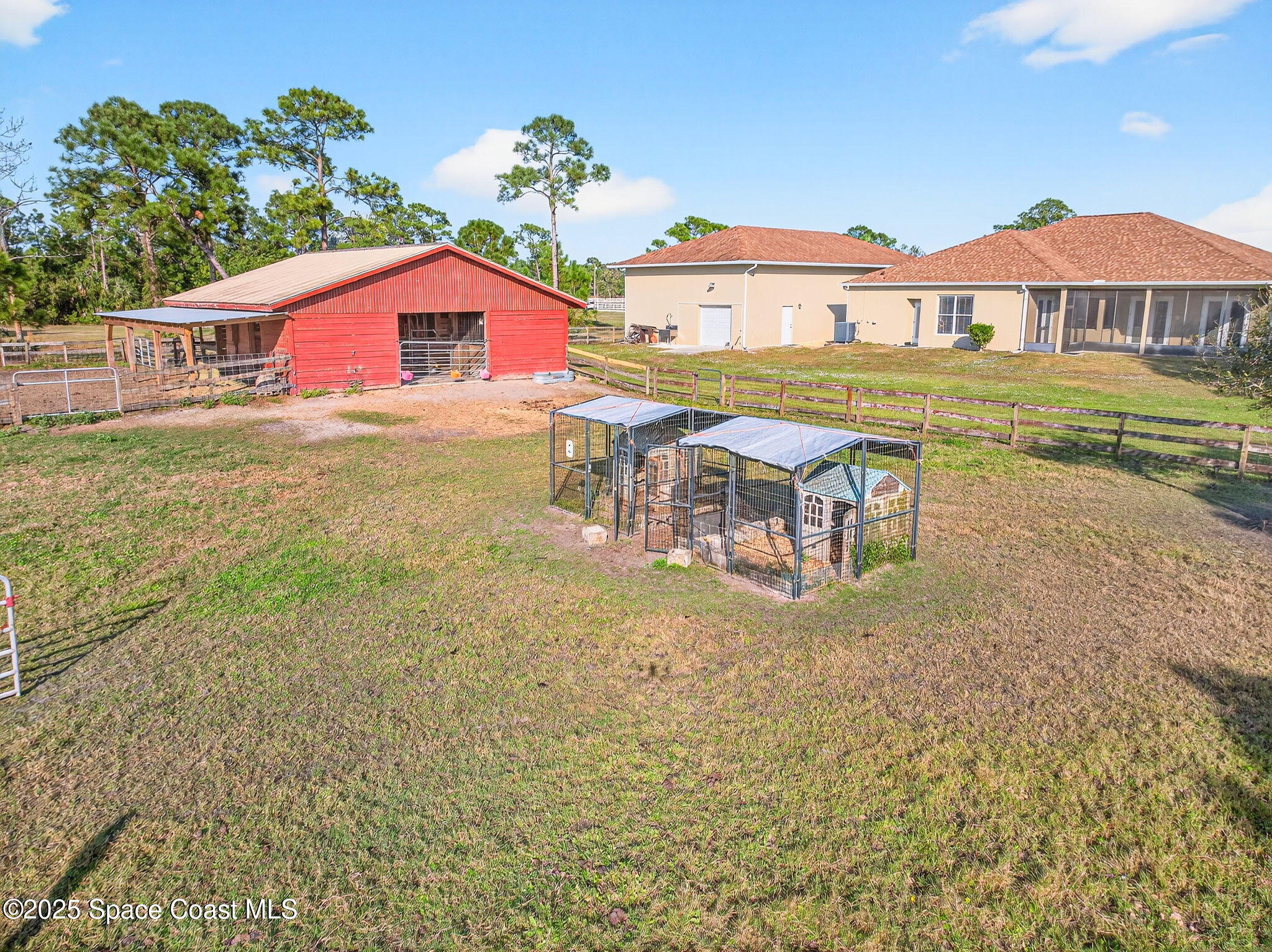 2740 Waring Lane Malabar, FL 32950 - Photo 43 of 98 a front view of house with yard and seating