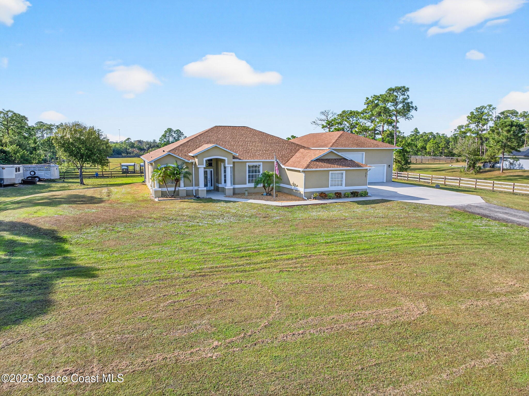 2740 Waring Lane Malabar, FL 32950 - Photo 6 of 98 a front view of a house with a yard