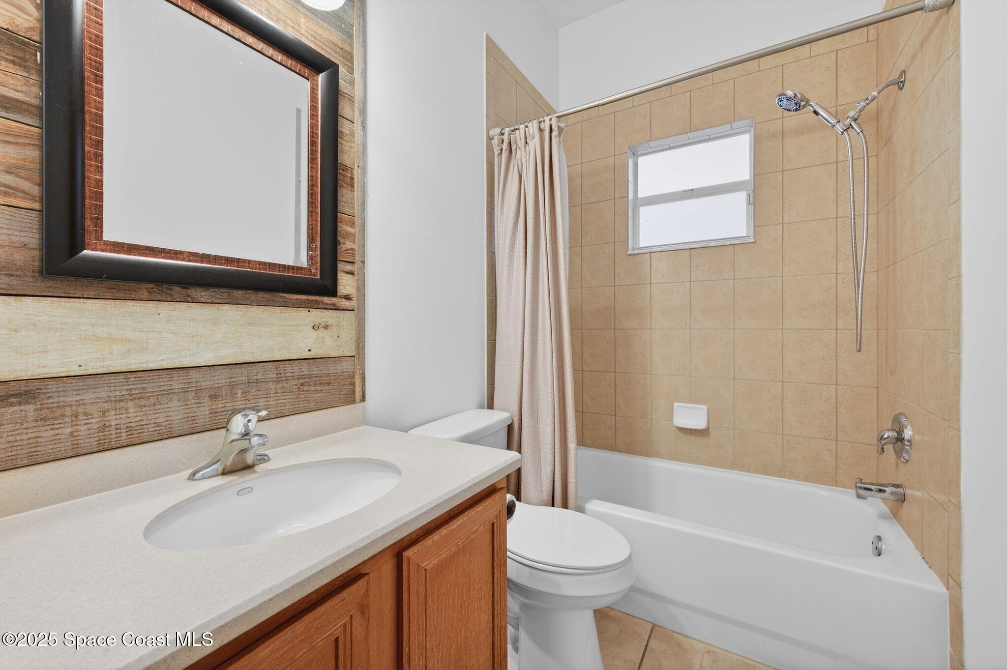 2740 Waring Lane Malabar, FL 32950 - Photo 82 of 98 a bathroom with a sink a toilet and a bathtub