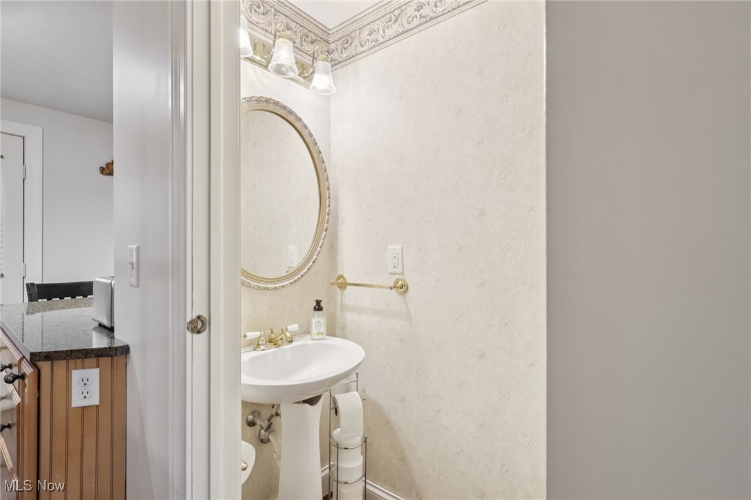 944 Hampton Ridge Drive Akron, OH 44313 - Photo 12 of 26 Half Bathroom on Main Level.