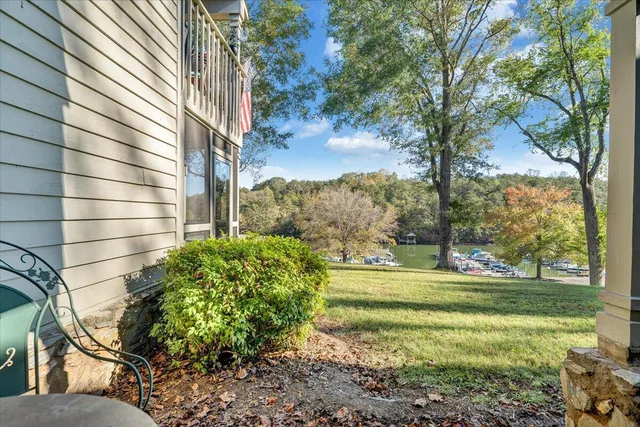 a backyard of a house with a garden and plants