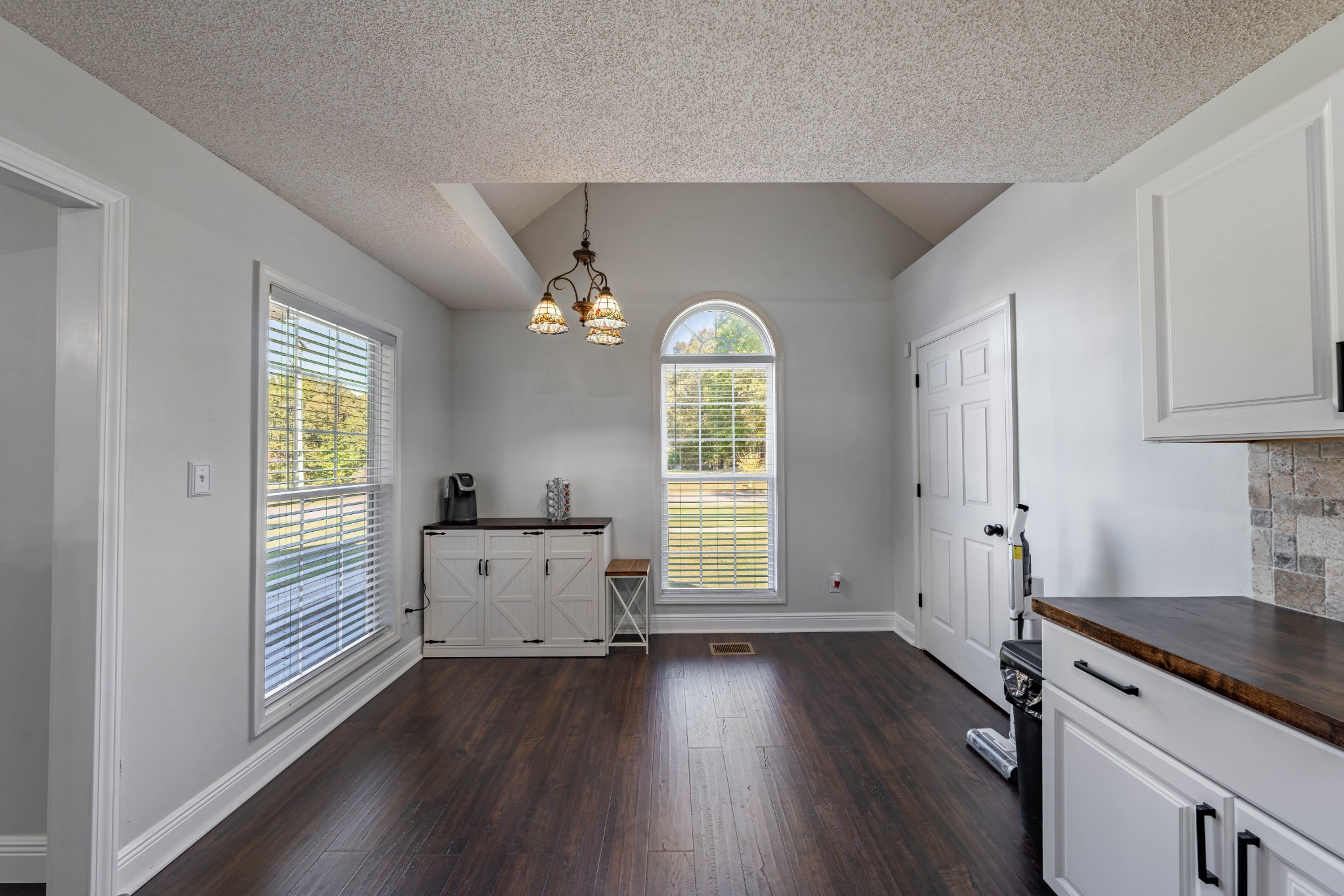 1101 Rustling Oaks Drive Pleasant View, TN 37146 - Photo 14 of 19 wooden floor in an empty room with a window and wooden floor