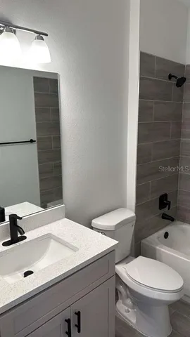 a bathroom with a sink and a toilet