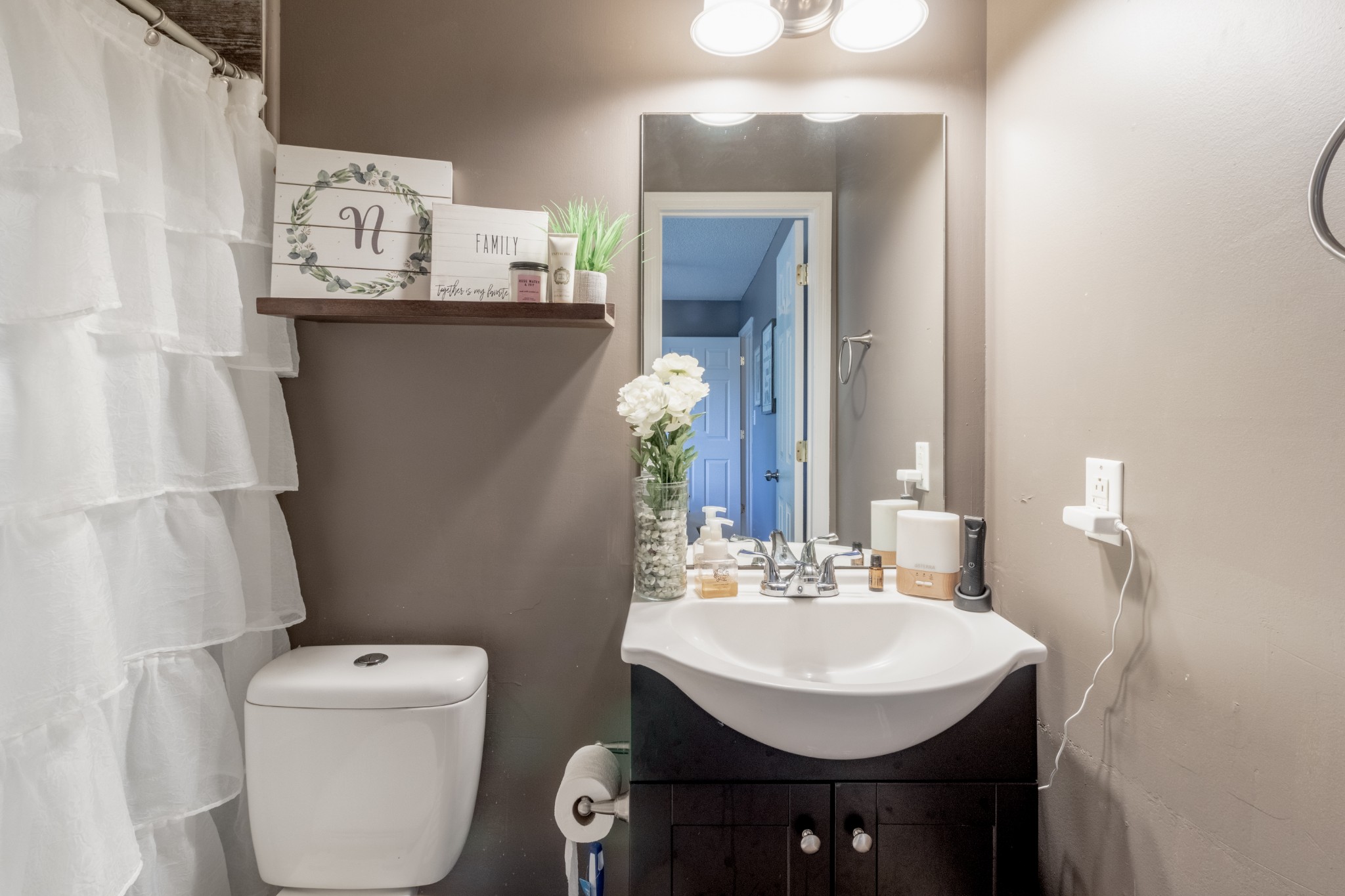 720 Dean Road Clarksville, TN 37040 - Photo 22 of 33 a bathroom with a sink toilet and mirror