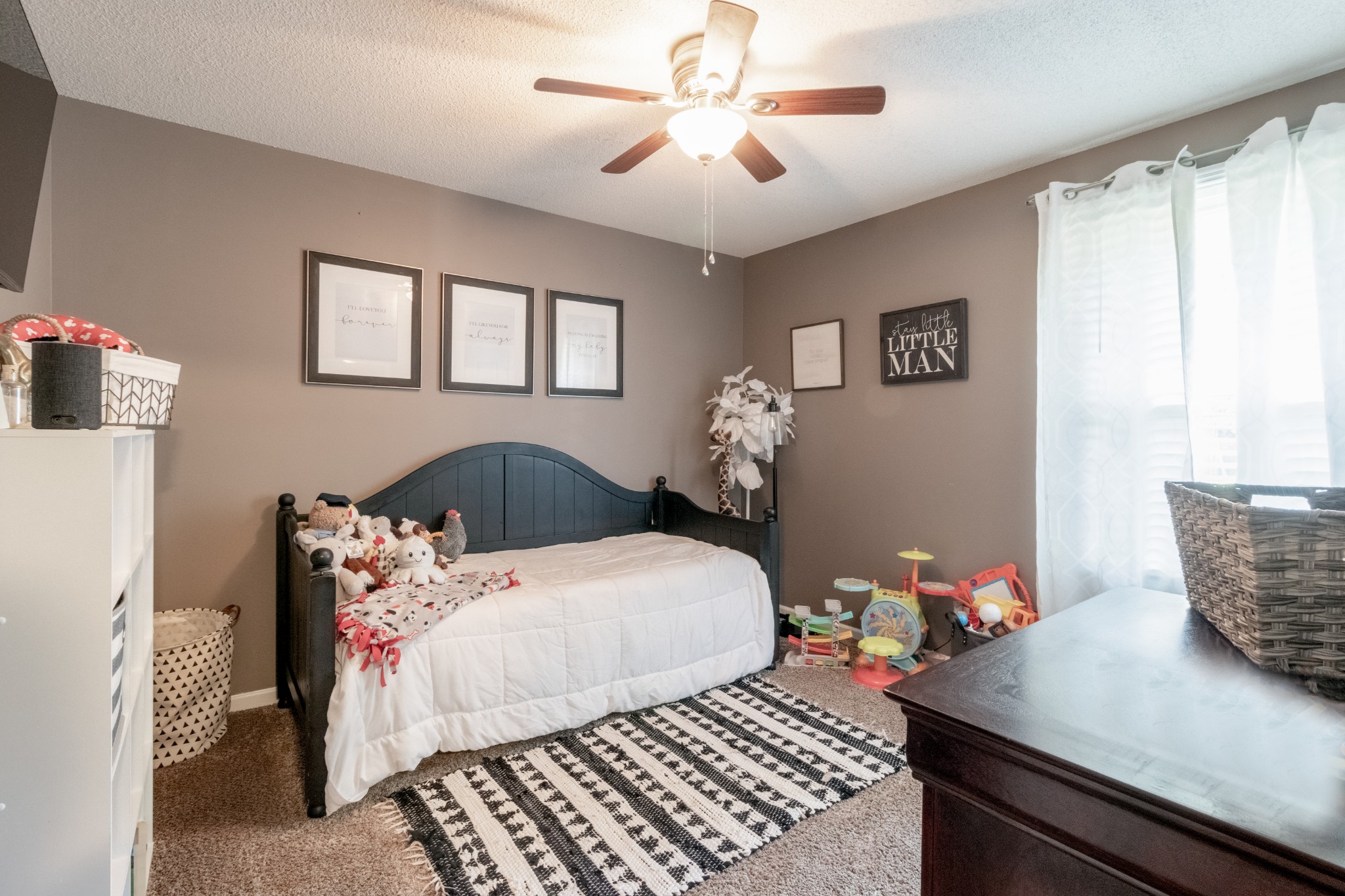 720 Dean Road Clarksville, TN 37040 - Photo 23 of 33 a bedroom with a bed and wooden floor