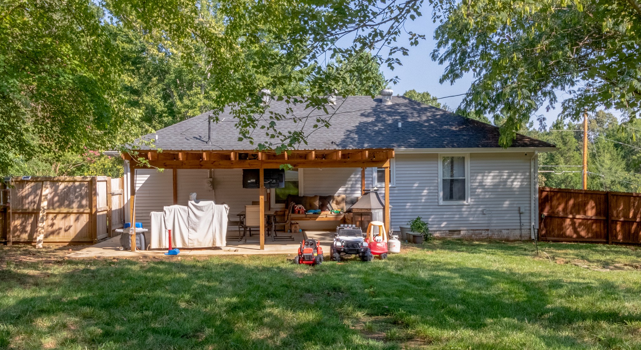 720 Dean Road Clarksville, TN 37040 - Photo 30 of 33 a view of a house with a small yard and a large tree