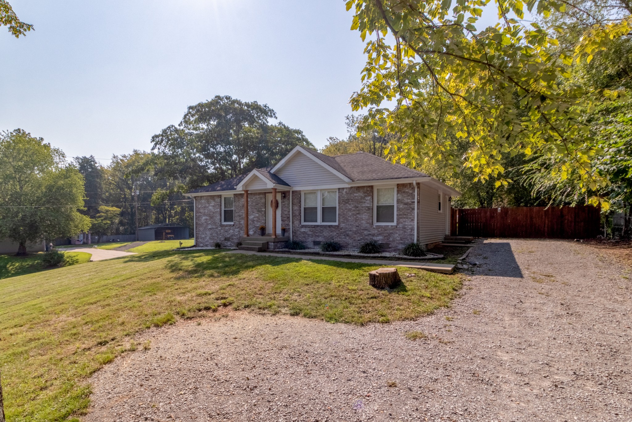 720 Dean Road Clarksville, TN 37040 - Photo 6 of 33 a view of a house with swimming pool and a yard