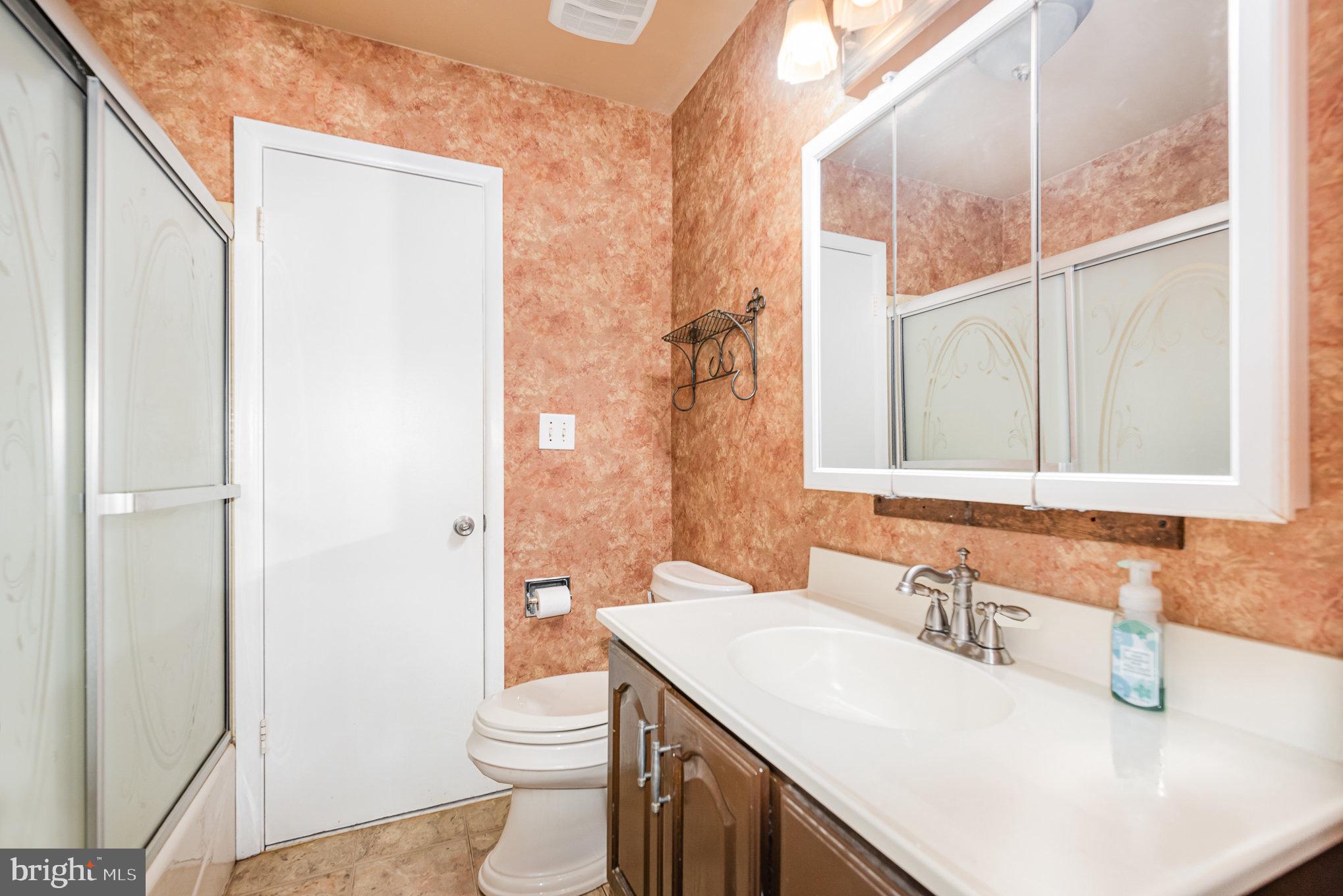 517 Joppa Farm Road Joppa, MD 21085 - Photo 15 of 25 a bathroom with a sink toilet and shower