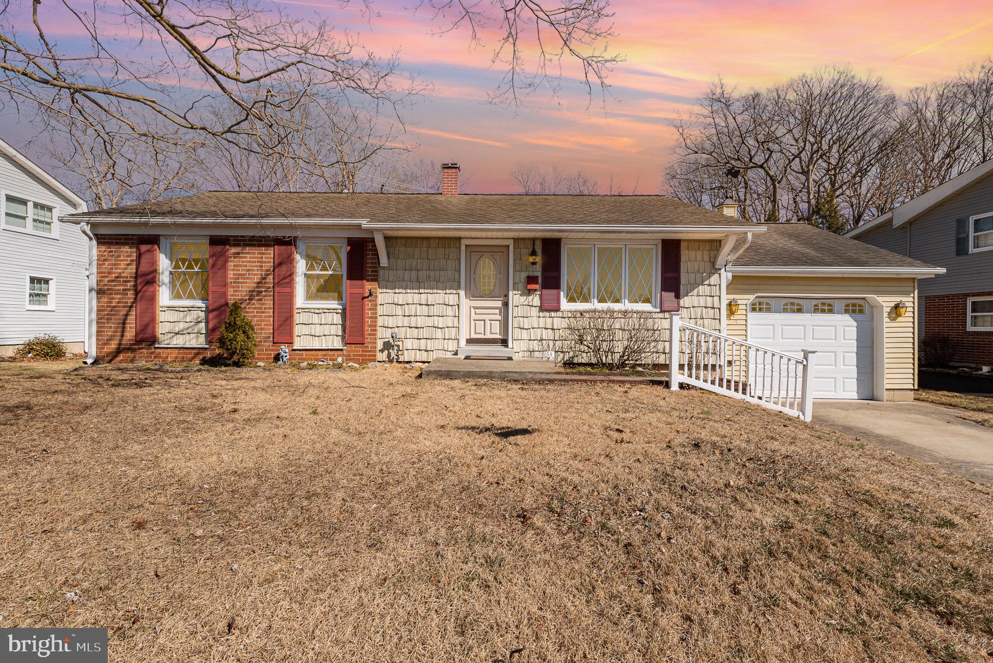 517 Joppa Farm Road Joppa, MD 21085 - Photo 2 of 25 a front view of a house with two yard