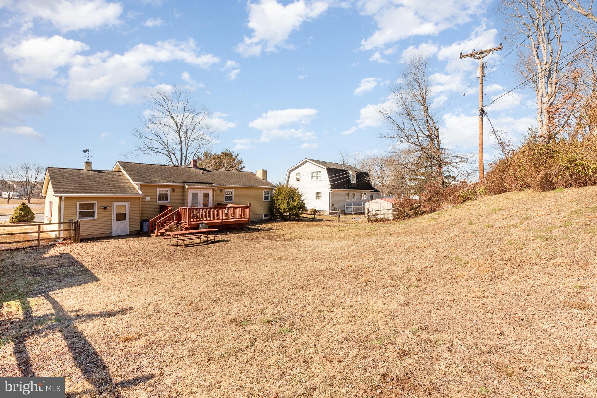 517 Joppa Farm Road Joppa, MD 21085 - Photo 23 of 25 a front view of a house with a yard covered in snow