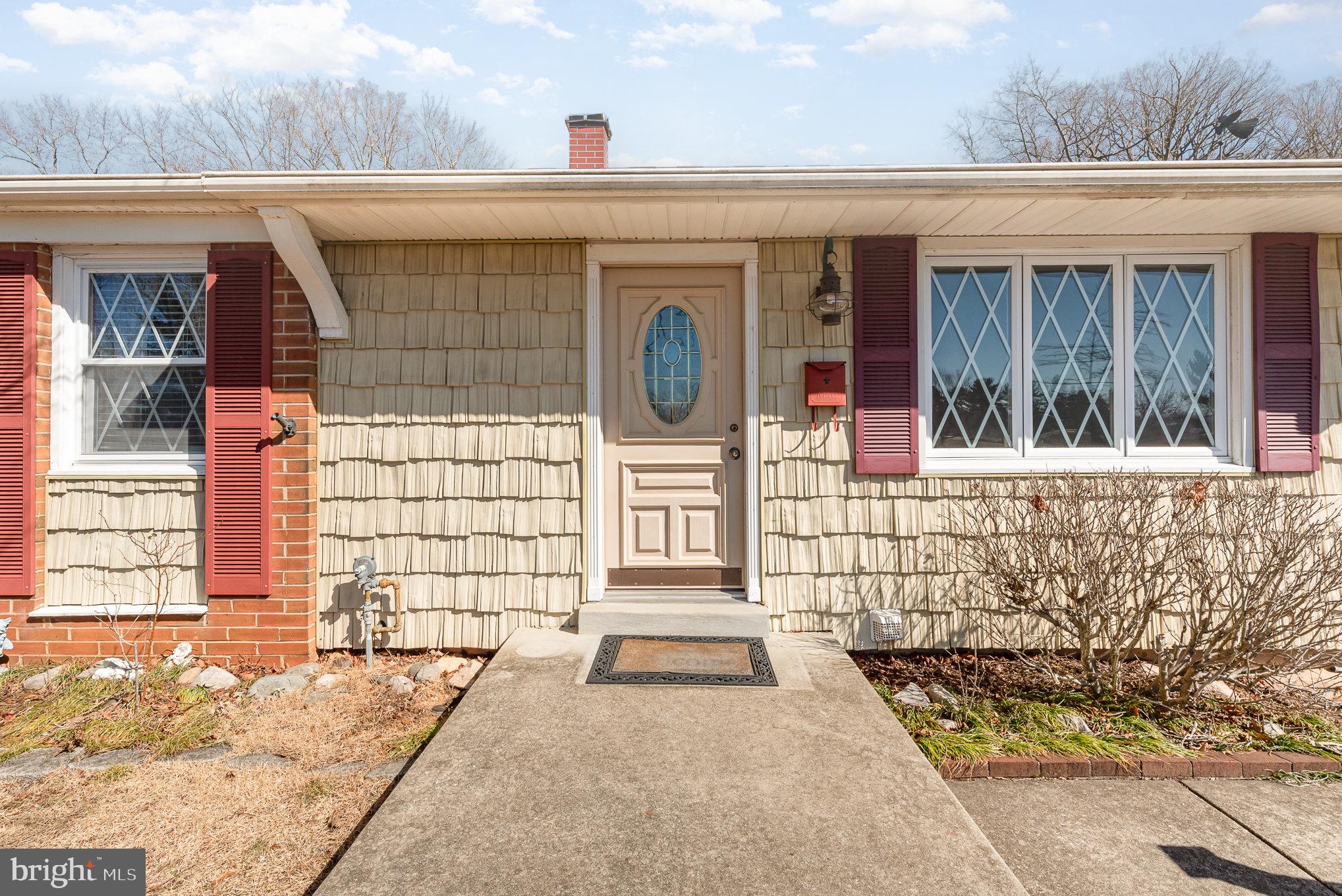 517 Joppa Farm Road Joppa, MD 21085 - Photo 4 of 25 a front view of a house with garden