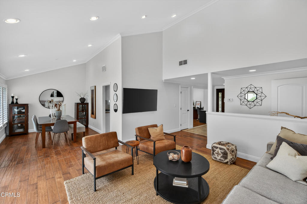 9325 La Shell Drive Tujunga, CA 91042 - Photo 10 of 46 a living room with furniture and a flat screen tv