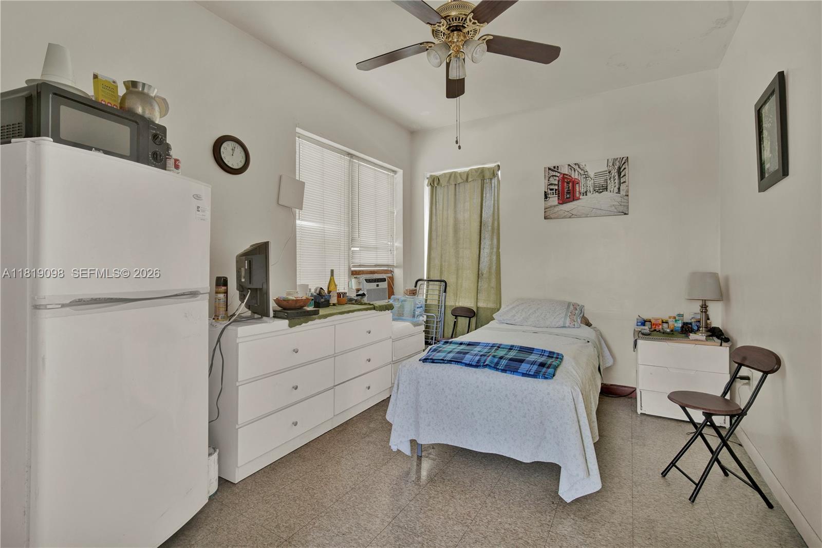 829 Southwest 19th Avenue Miami, FL 33135 - Photo 43 of 54 a bedroom with furniture and a bed