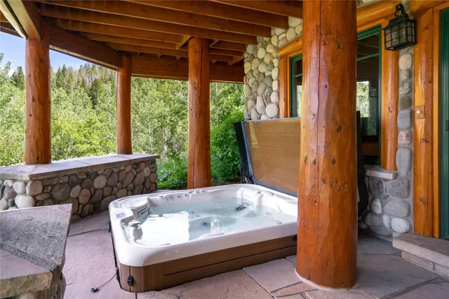 a bath tub sitting in front of a window