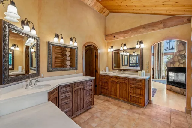 a view of a house with a yard and mountain view