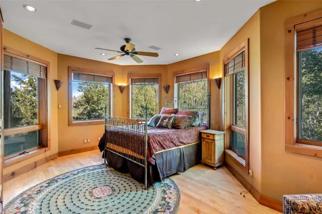 a bathroom with a sink mirror toilet and shower