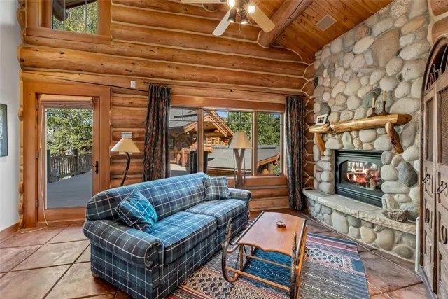 a view of a patio with a table and chairs