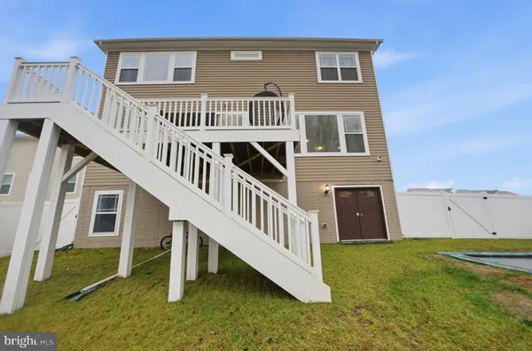 a view of a house with a deck
