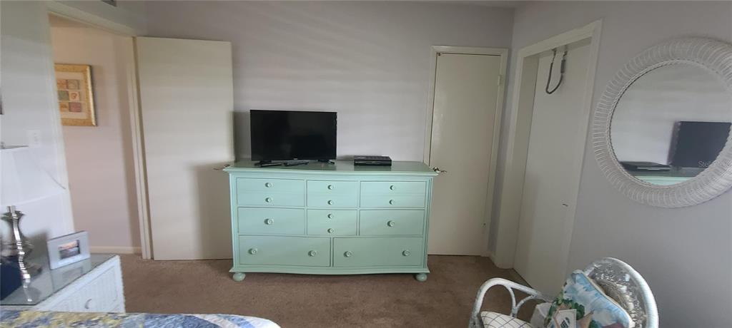 815 Ocean Shore Boulevard, Unit 7B Ormond Beach, FL 32176 - Photo 12 of 19 a view of a dresser