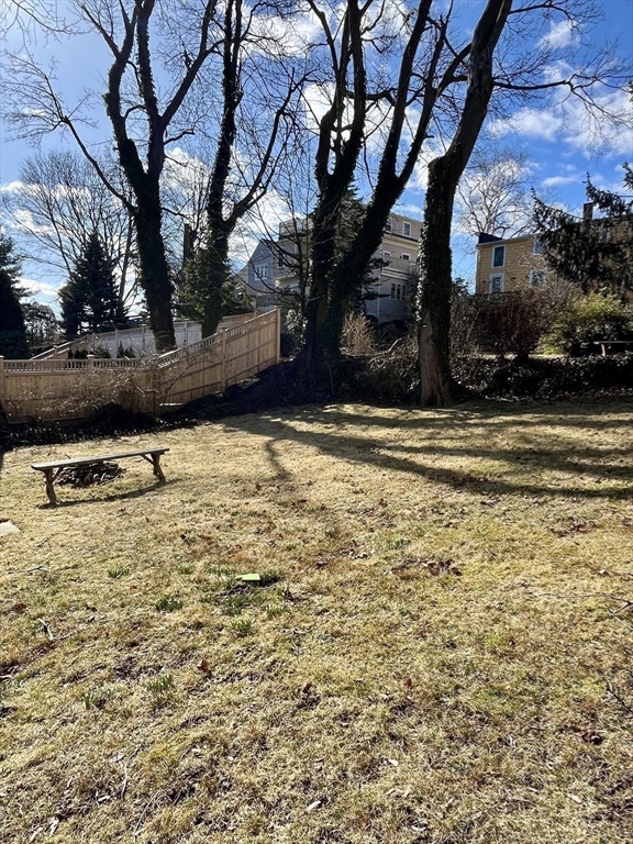 18 Guernsey Street, Unit 2 Marblehead, MA 01945 - Photo 21 of 23 a view of a yard with a house