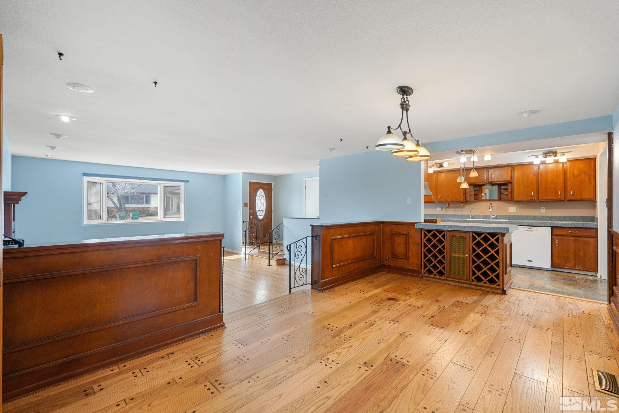 3325 Norman Drive Reno, NV 89509 - Photo 2 of 40 a living room with furniture and wooden floor