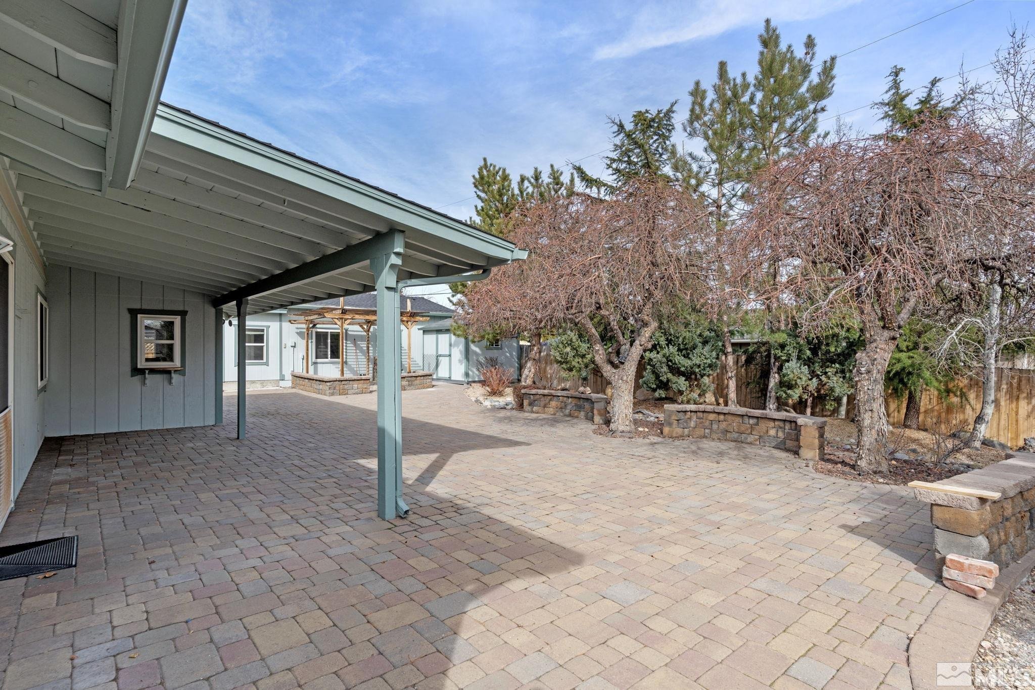 3325 Norman Drive Reno, NV 89509 - Photo 36 of 40 a view of a house with backyard and trees