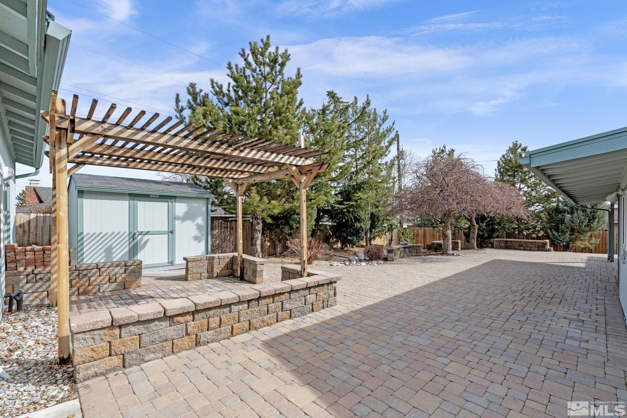 3325 Norman Drive Reno, NV 89509 - Photo 4 of 40 a view of a house with entertaining space and sitting area