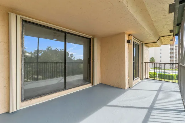 a view of a room with a large window