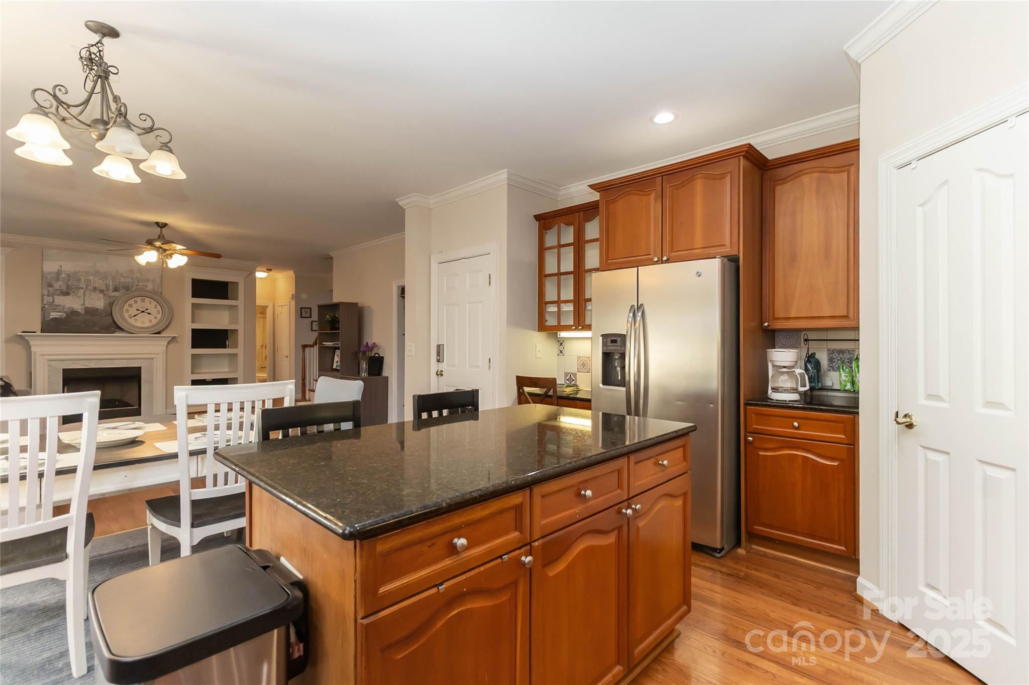 1608 Copperplate Road Charlotte, NC 28262 - Photo 12 of 31 a kitchen with a refrigerator a stove a sink and a dining table