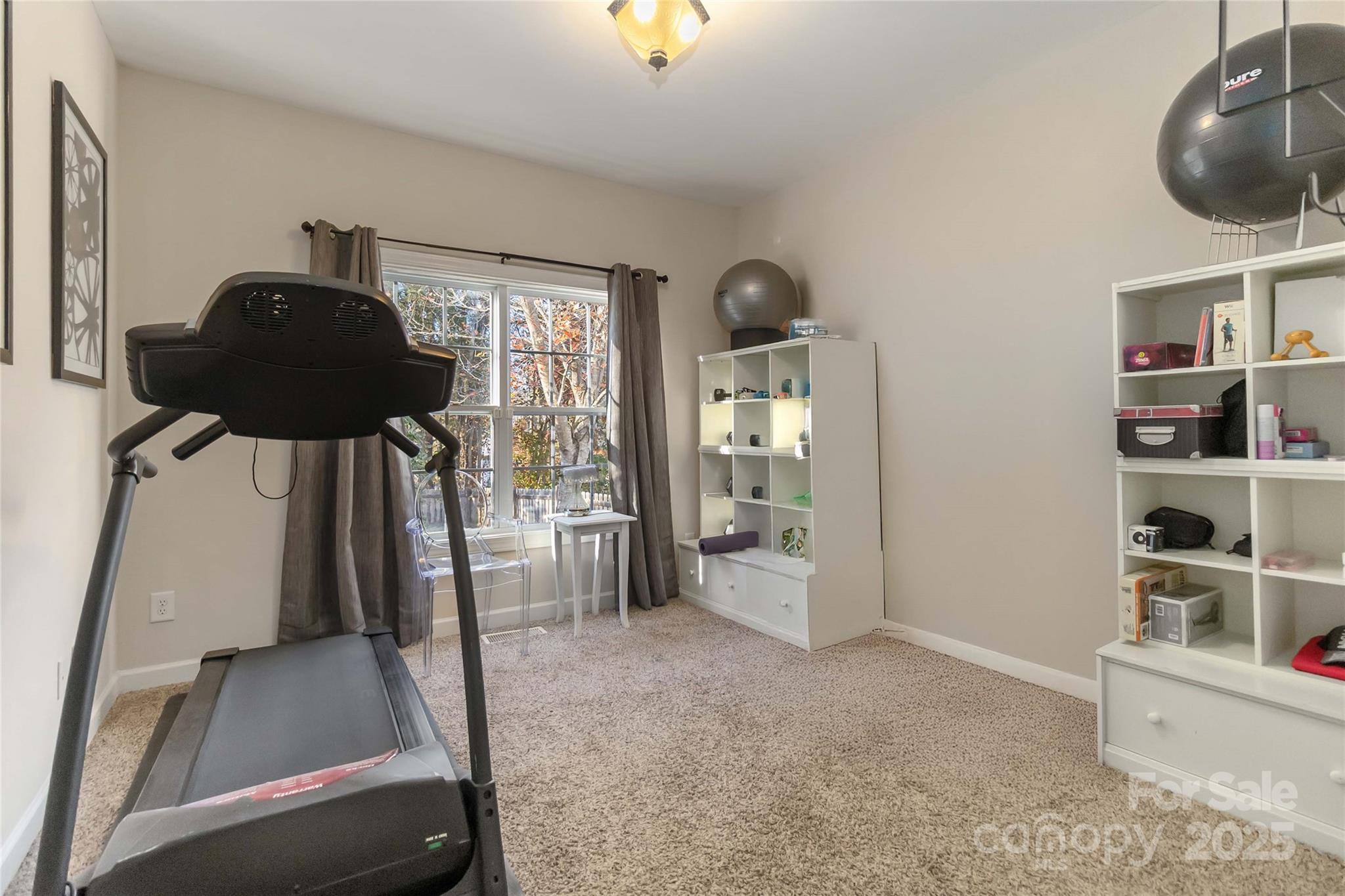1608 Copperplate Road Charlotte, NC 28262 - Photo 27 of 31 a living room with furniture and a window