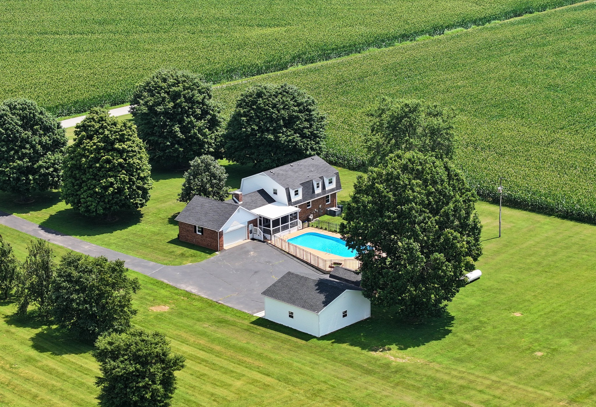an aerial view of a house with a garden