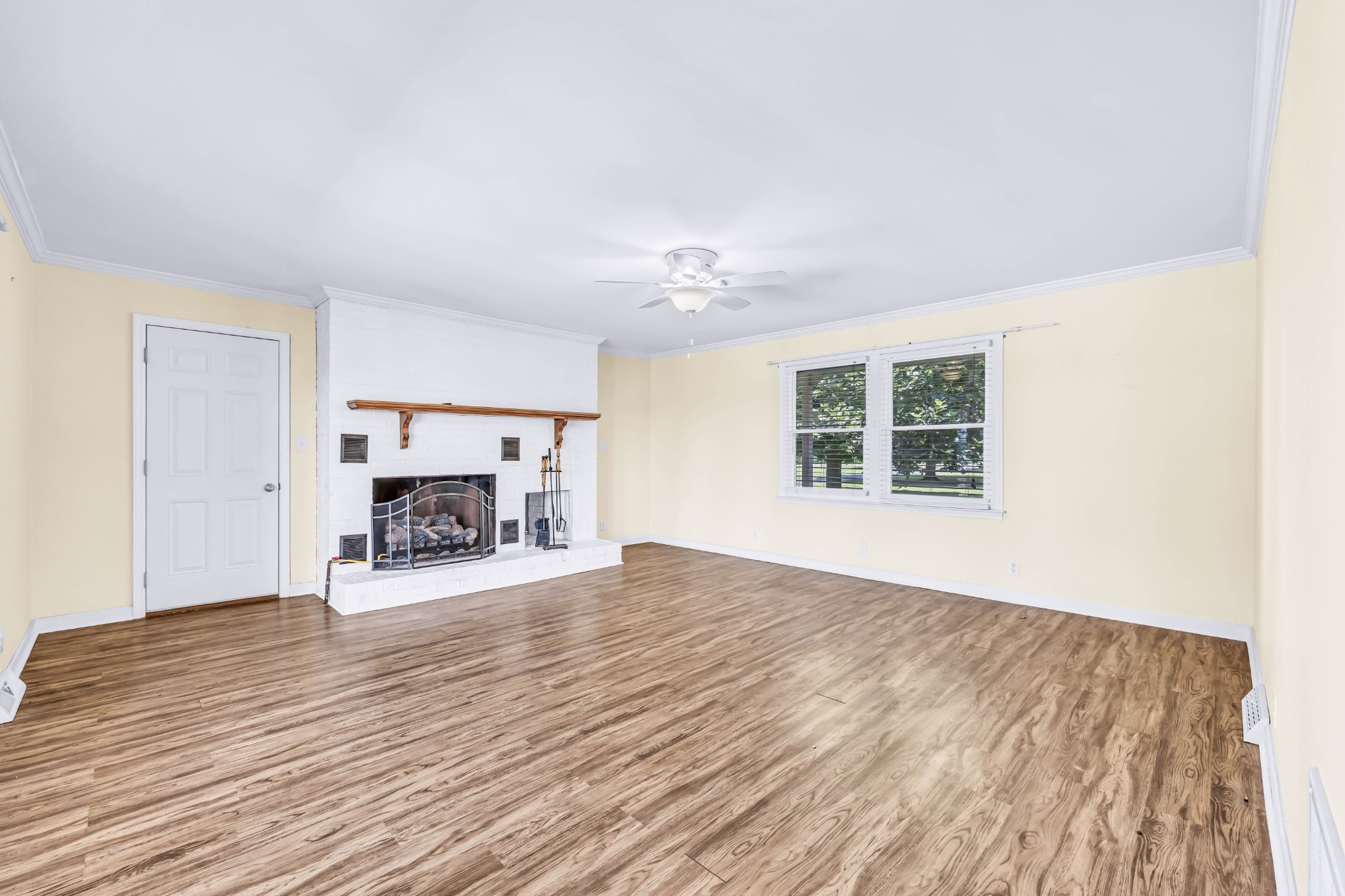 511 Snardon Mill Road Allensville, KY 42204 - Photo 16 of 44 a view of a livingroom with a fireplace and window