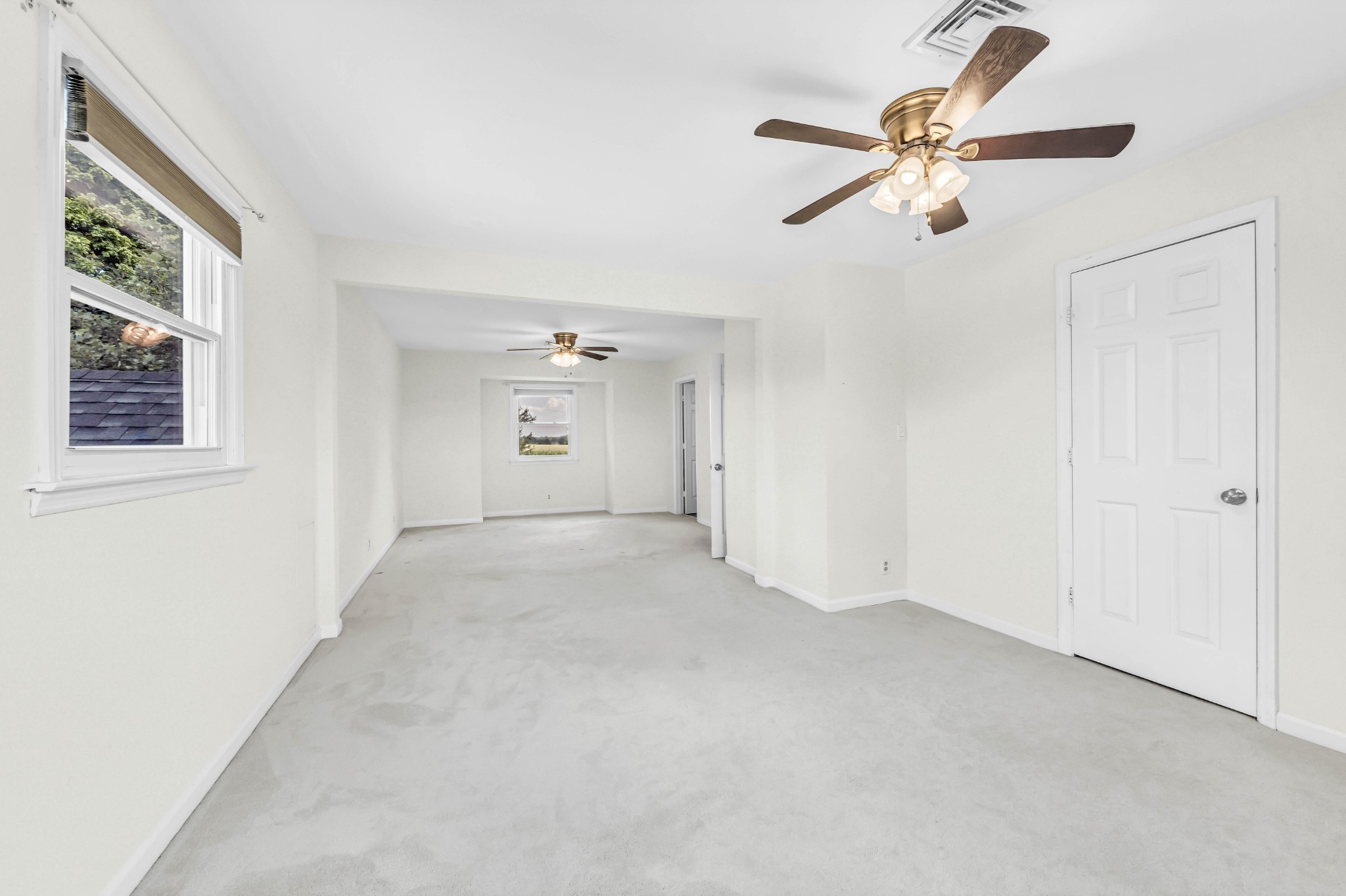 511 Snardon Mill Road Allensville, KY 42204 - Photo 29 of 44 an empty room with fan and windows